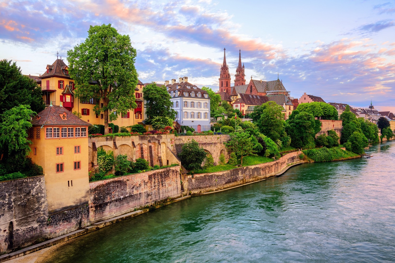 The_Old_Town_of_Basel_with_red_stone_Munster_cathedral_and_the_Rhine_river__Switzerland__in_dramatic_sunset_light_small.jpg